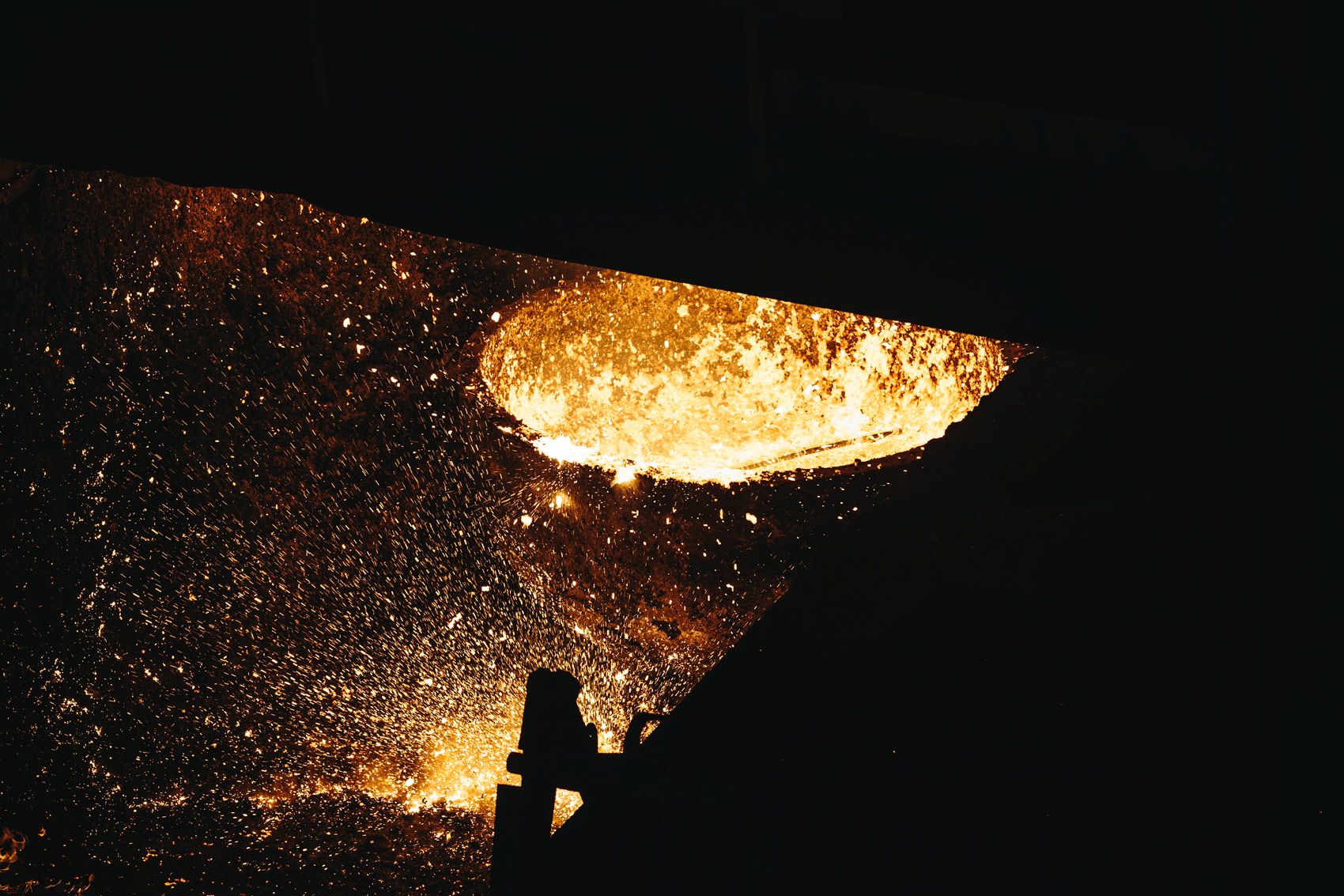 melted steel splattering for washington dc industrial photographer