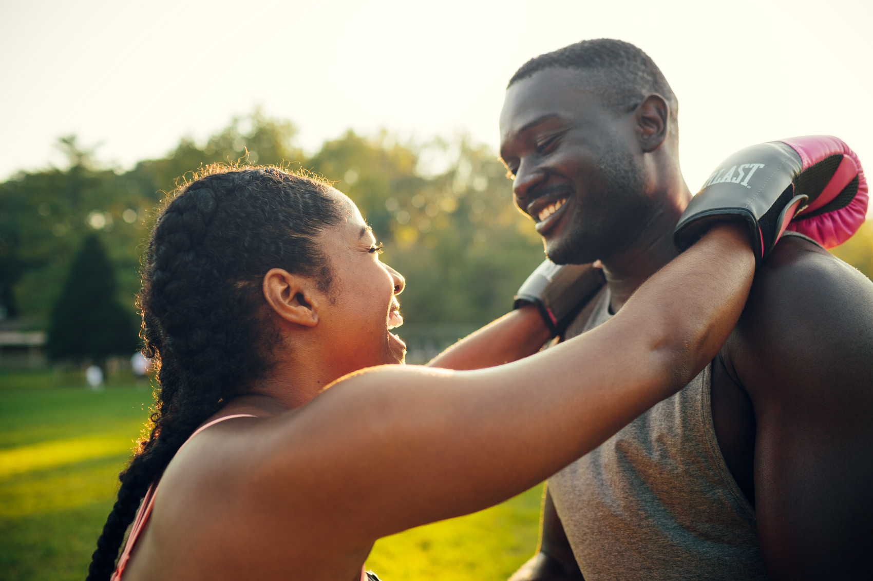 couple embracing after boxing practice for washington dc commercial photography