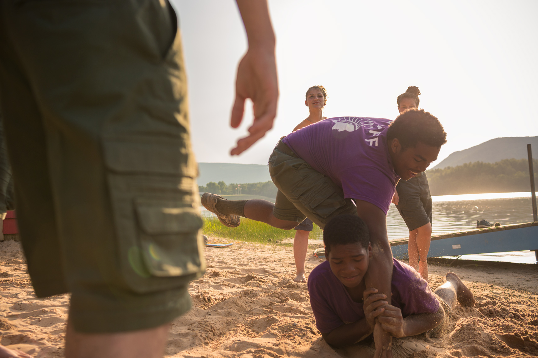 boy scouts wrestling on the beach, washington dc photojournalism