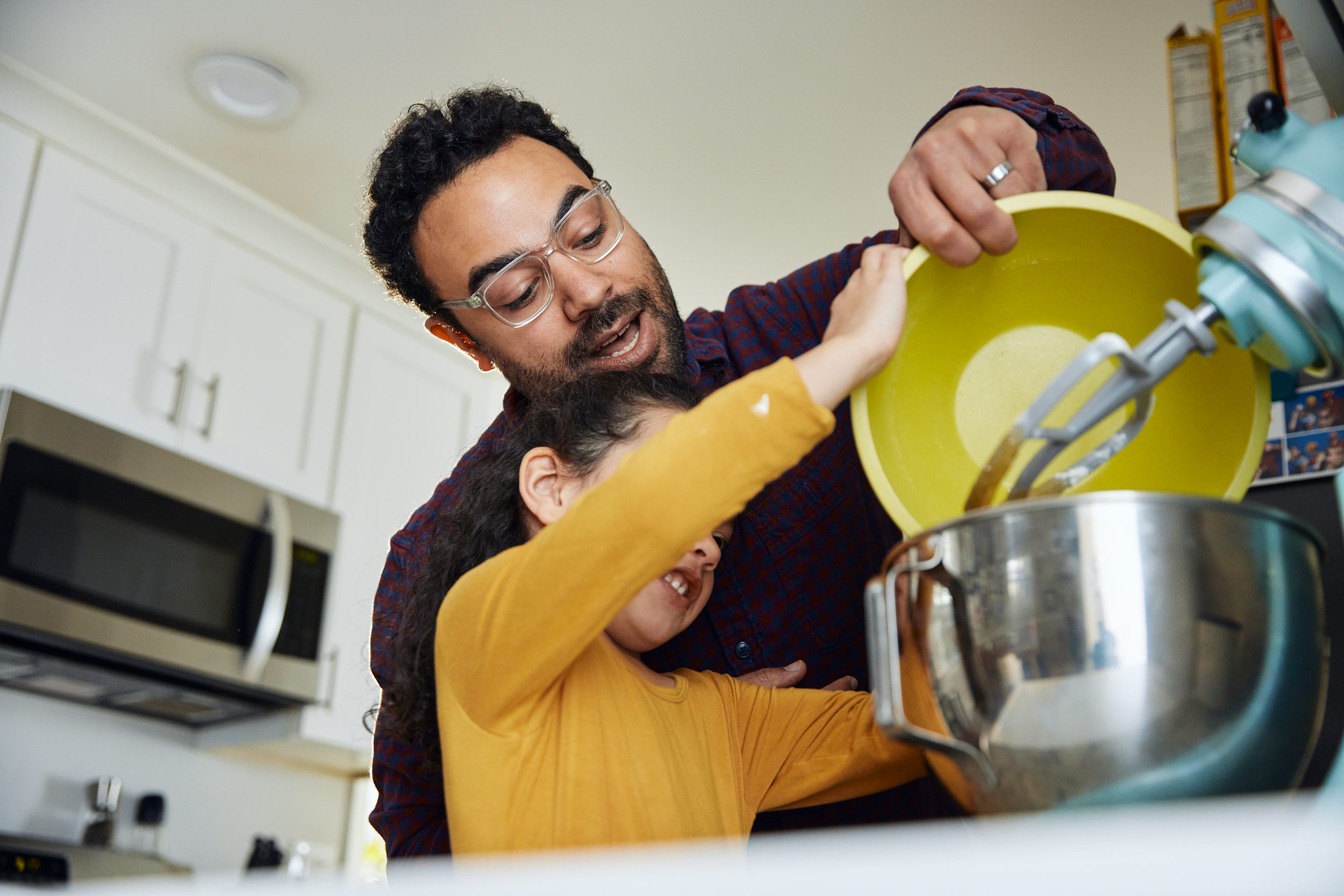 father-daughter-filling-mixing-bowl-dc-commercial-photography