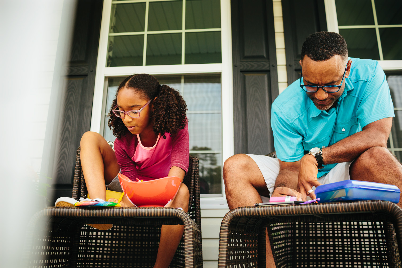 father and daughter drawing on porch, washington dc commercial photography