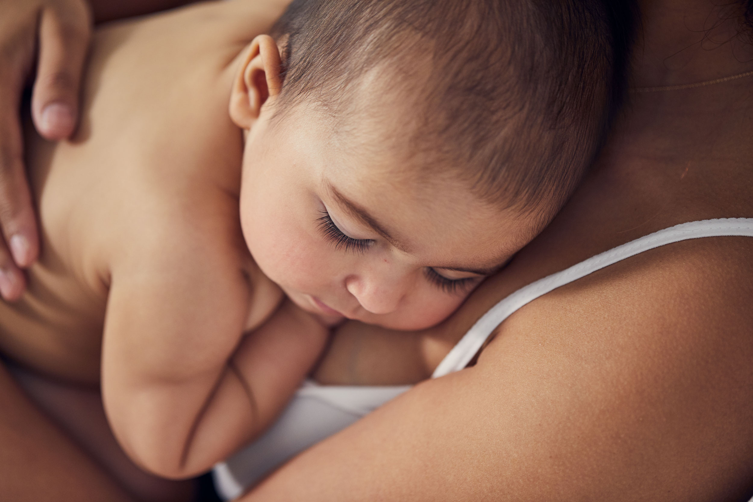 baby sleeping on mom, washington dc commercial photography
