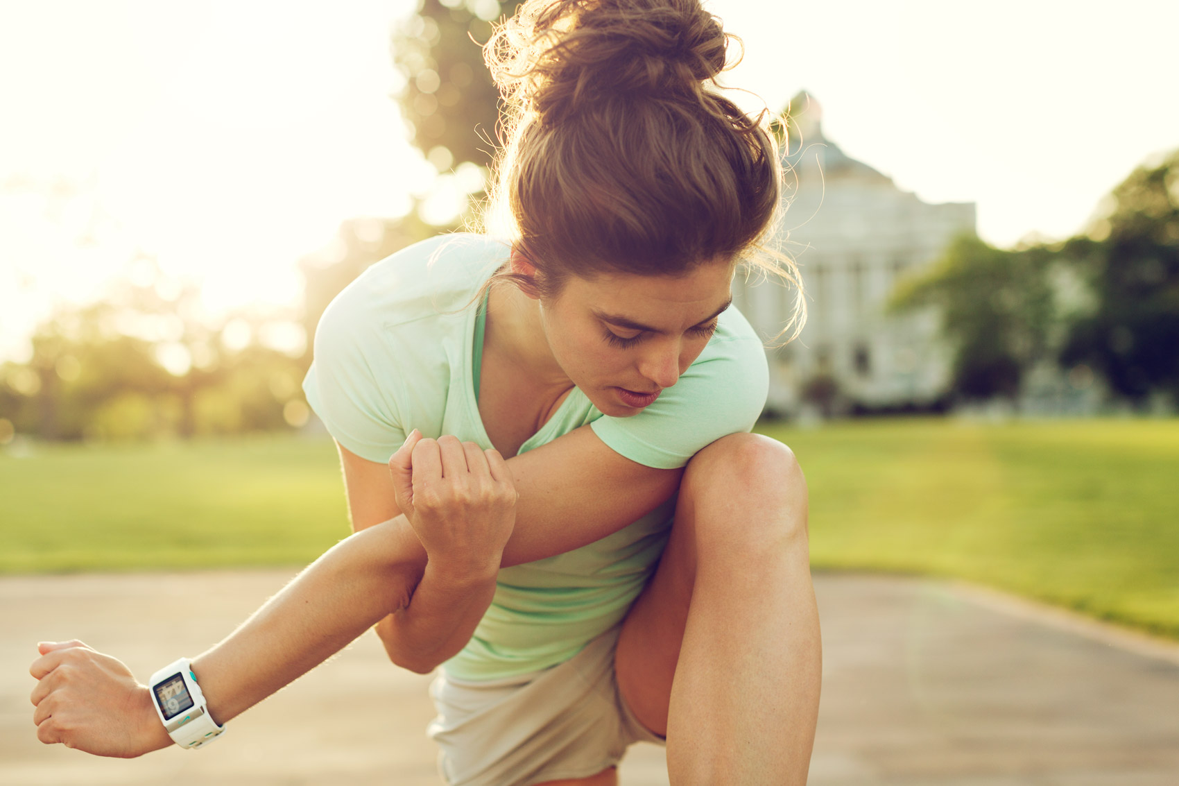 woman stretching for morning run for washington dc commercial photography