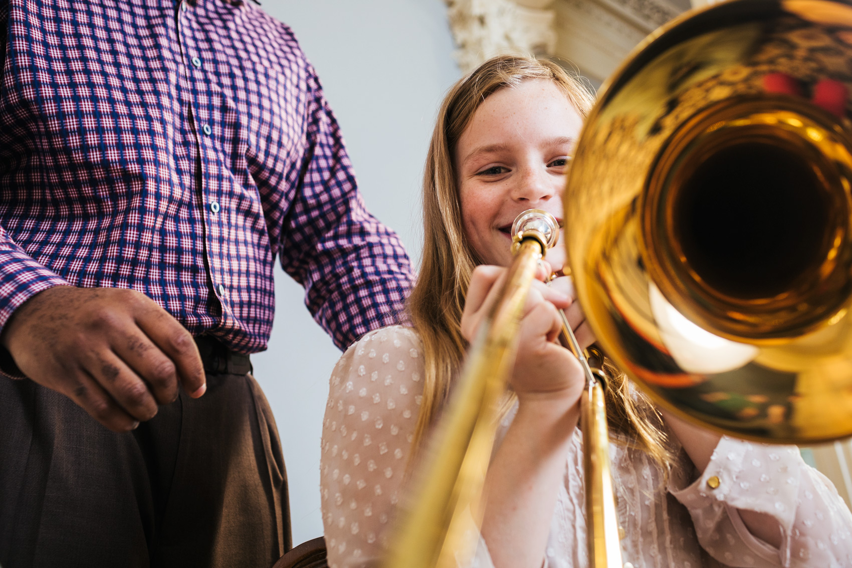 tween girl trombonist in music lesson, washington dc commercial photography