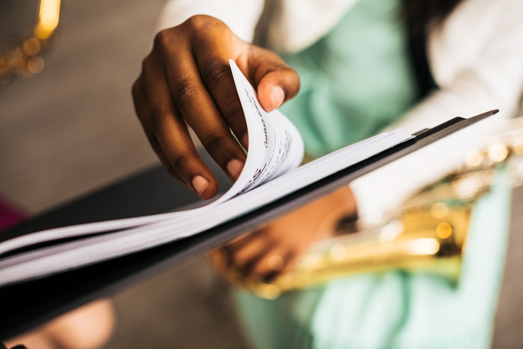 girl turning page of sheet music, washington dc commercial photography