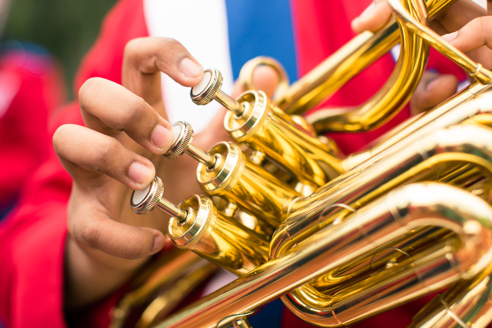 fingers touching trumpet keys for washington dc commercial photography