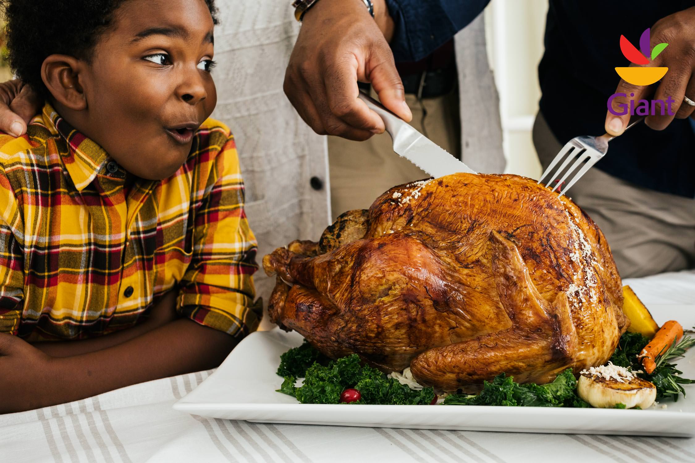 young boy watching turkey carving, washington dc commercial photography