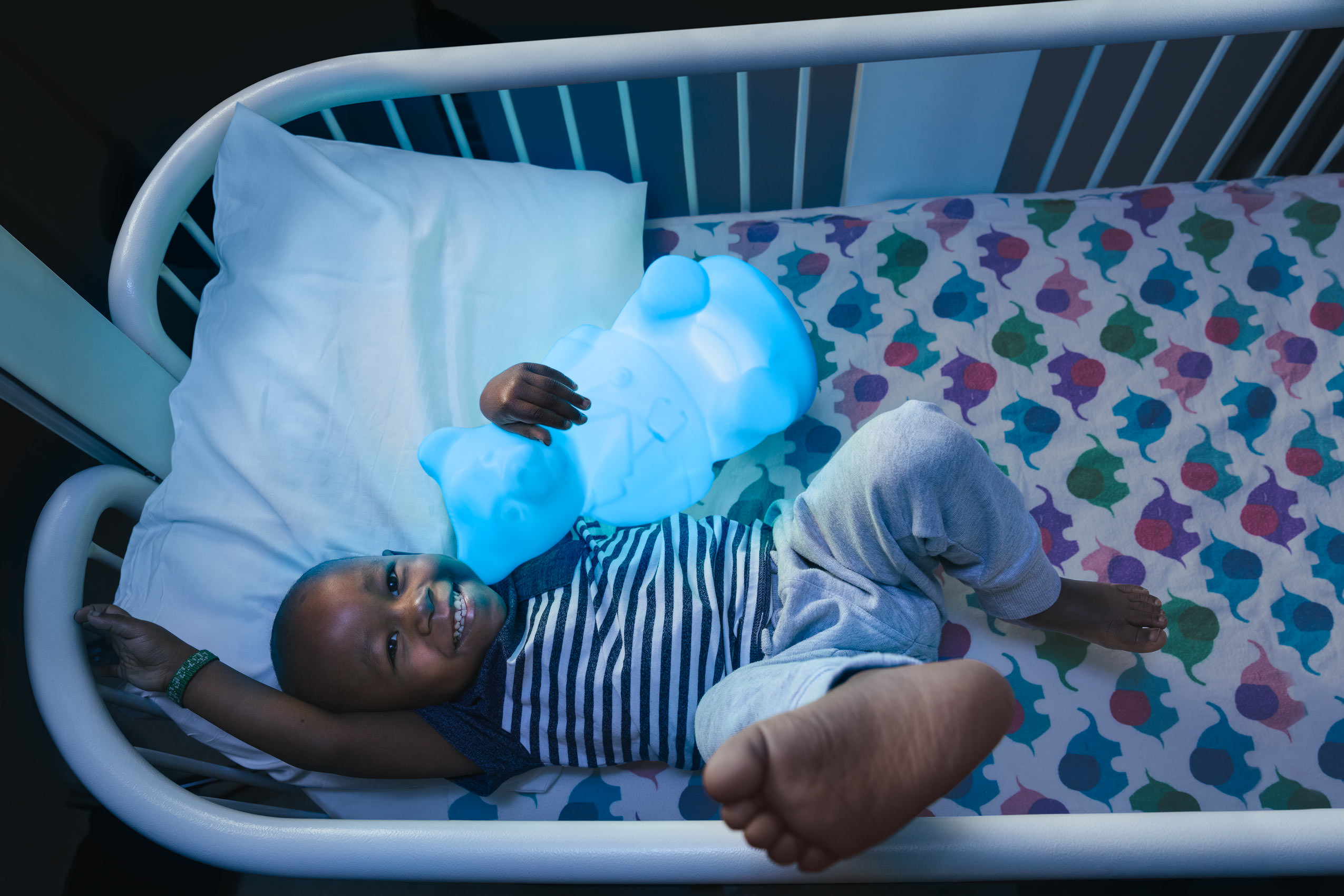 young hospital patient with blue glowing bear for washington dc healthcare photography